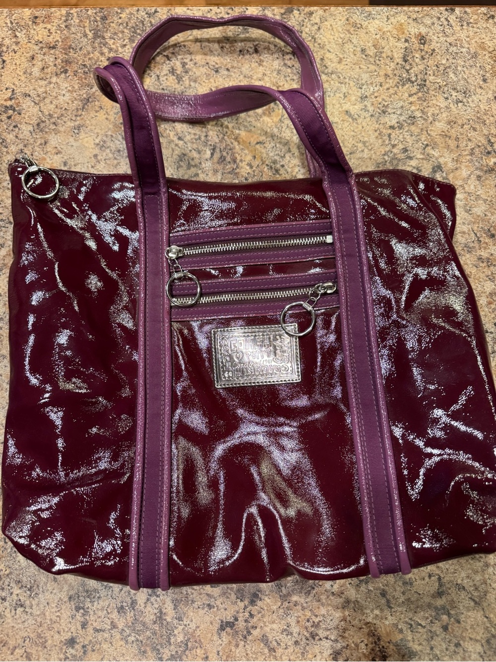 Coach - Poppy Patent Plum Tote with Front Zip Pockets